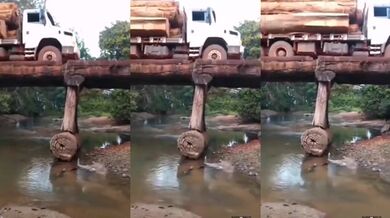 Těžké nákladní auto na dřevěném mostě