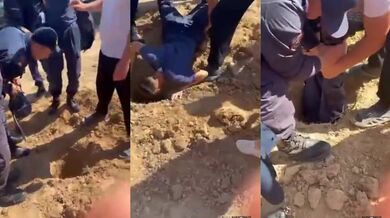 Dítě zachráněné z díry na pláži