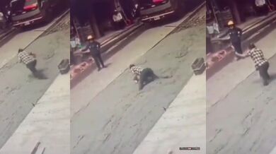 Žena vkráčí do čerstvě položeného betonu