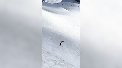 Pokus o trojitý backflip na lyžích